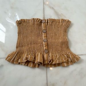 tan and white tube top